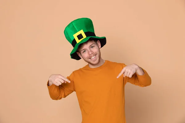 Attractive Young Guy Big Green Hat Yellow Background — Stock Photo, Image