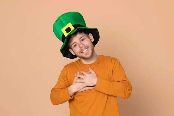 Attractive Young Guy Big Green Hat Yellow Background — Stock Photo, Image