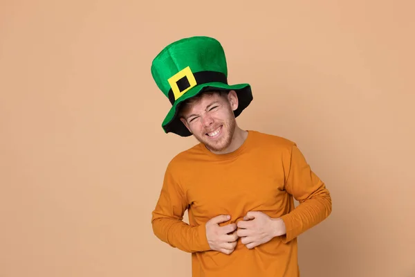 Attractive Young Guy Big Green Hat Yellow Background — Stock Photo, Image