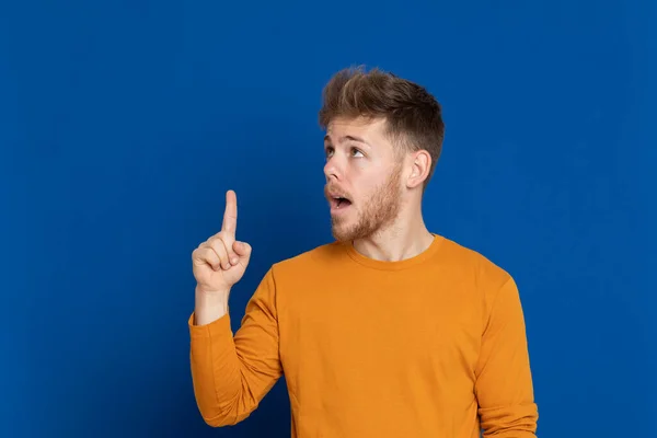 Attractive Young Guy Yellow Shirt Blue Background — Stock Photo, Image