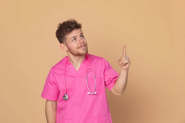 African Doctor Wearing Pink Uniform Yellow Background — Stock Photo, Image