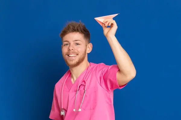 African Doctor Wearing Pink Uniform Blue Background — Stock Photo, Image
