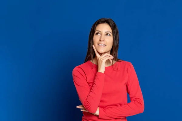 Attractive Brunette Girl Wearing Red Shirt Blue Background — Stock Photo, Image