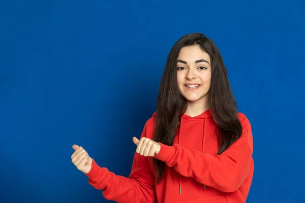 Brunette Young Girl Wearing Red Jersey Blue Background — Stock Photo, Image