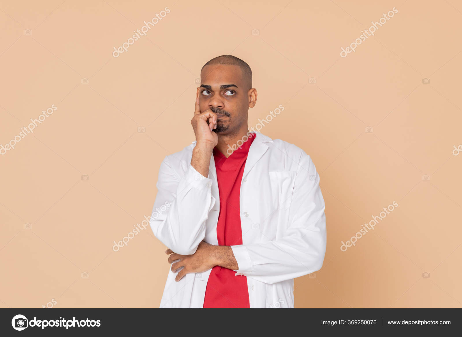 African Doctor Wearing Lab Coat Yellow Background Stock Photo by ©Gelpi