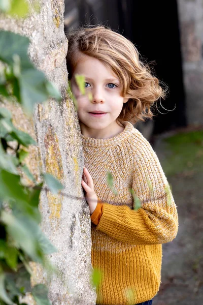 Happy Blond Child Long Hair Behide Tree — Stock Photo, Image