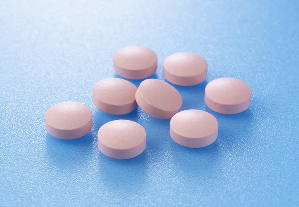 Pink Pills Placed Blue Background — Stock Photo, Image