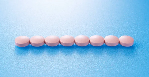 Pink Pills Placed Blue Background — Stock Photo, Image
