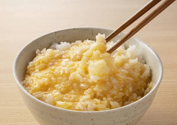 Scooping Rice Chopsticks Japanese Egg Wooden Backdrop — Stock Photo, Image