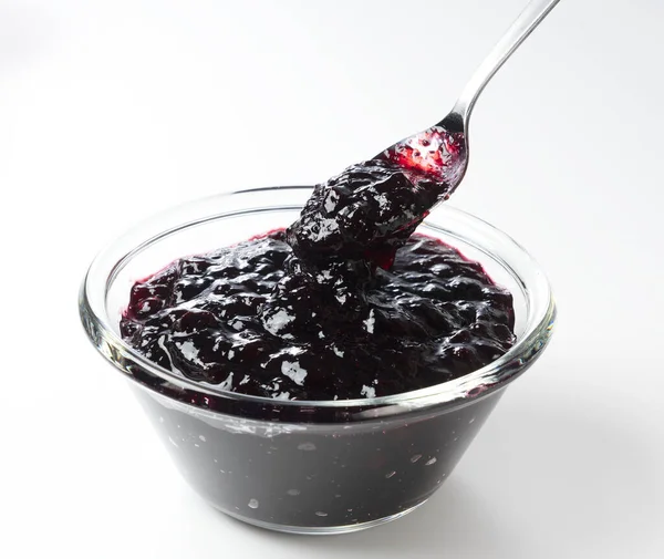 Spooning Blueberry Jam Glass Bowl Set White Background — Stock Photo, Image