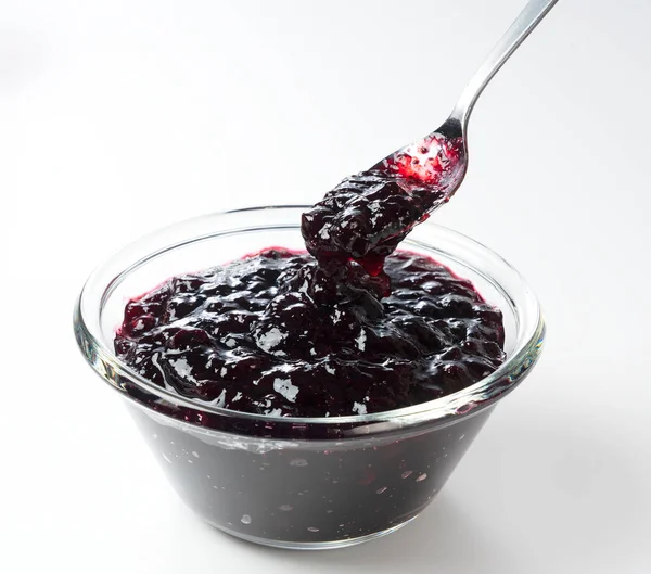 Spooning Blueberry Jam Glass Bowl Set White Background — Stock Photo, Image