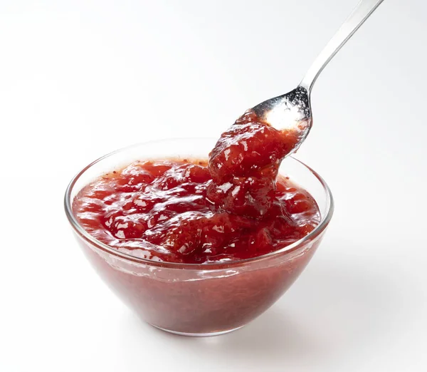 Spooning Strawberry Jam Glass Bowl White Background — Stock Photo, Image