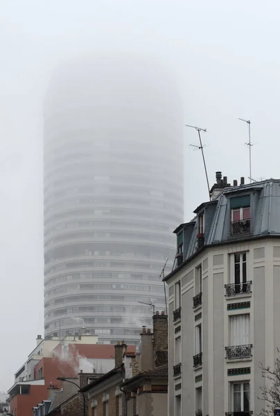 fog on tower in the 13 th arrondissement of Paris