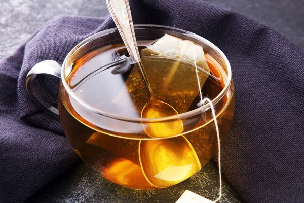 Cup of hot tea with teabag. Cup is from clear glass. — Stock Photo, Image