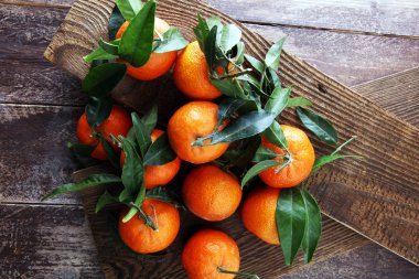taze olgun tangarines, gıda closeup ahşap arka plan üzerinde