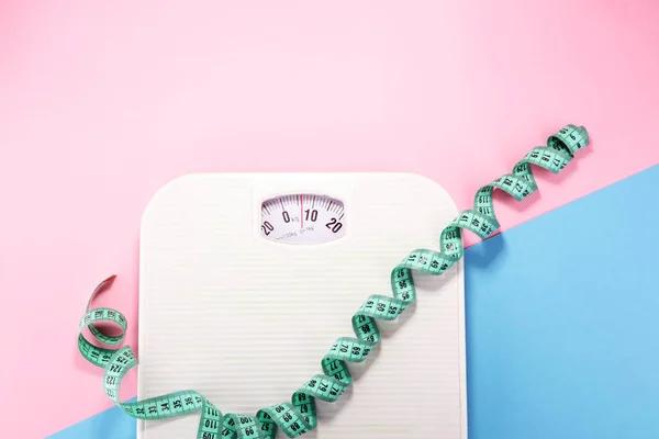 Weight and tape measure and concept of diet and healthy lifestyl — Stock Photo, Image
