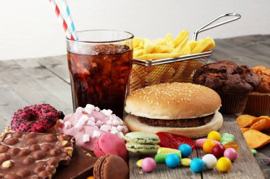 Sağlıksız ürünler. yemek vücut, deri, kalp ve dişler için kötüdür..