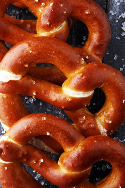 German pretzels with salt close-up on the table — Stock Photo, Image