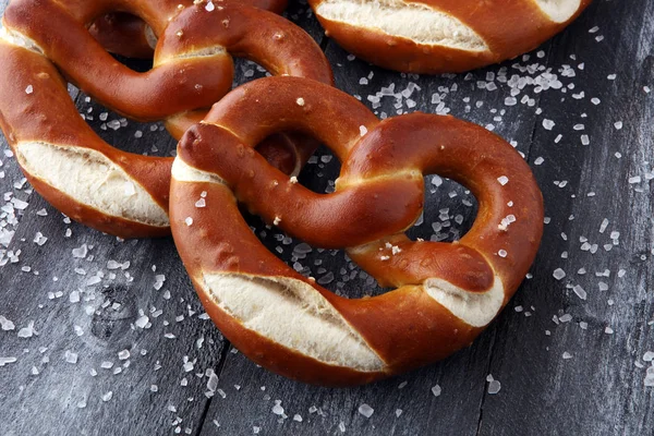 German pretzels with salt close-up on the table — Stock Photo, Image