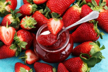 strawberry jam with fresh strawberries. marmalade on spoon and j clipart