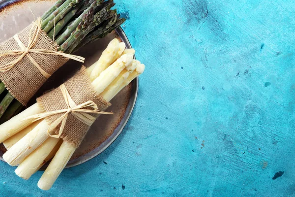 Bunch of fresh white asparagus and green asparagus