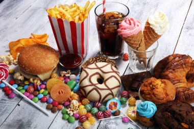 Sağlıksız ürünler. yemek vücut, deri, kalp ve dişler için kötüdür..