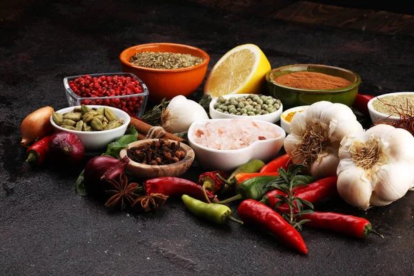 Spices and herbs on table. Food and cuisine ingredients for good — Stock Photo, Image