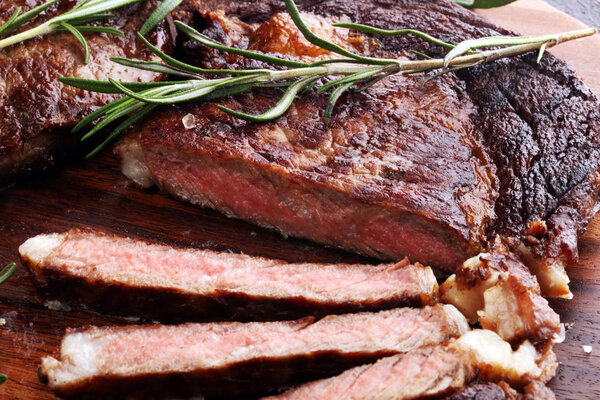Barbecue Rib Eye Steak or rump steak - Dry Aged Wagyu Entrecote Steak on table