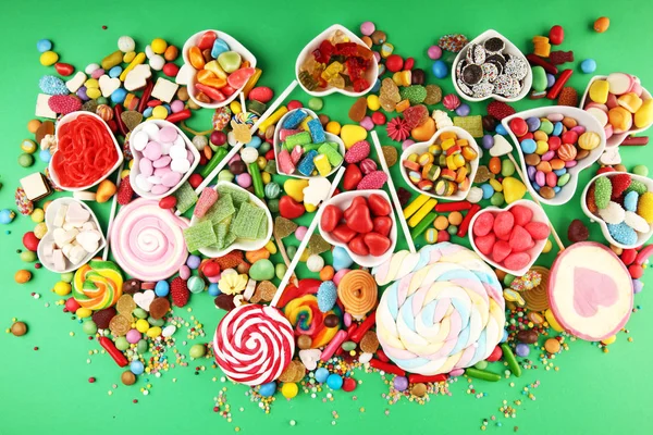 Bonbony, želé a cukrem. barevné spektrum různých childs — Stock fotografie
