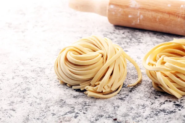 Closeup of raw homemade pasta. fresh italian traditional raw fre