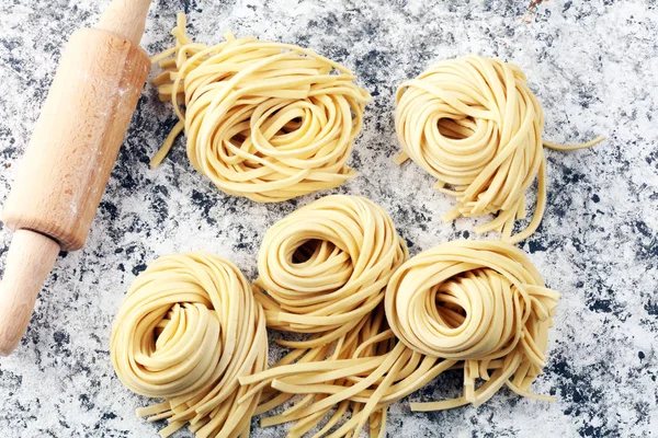 Closeup of raw homemade pasta. fresh italian traditional raw fre