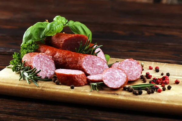 Sausage slices, smoked meat product (tasty snack salami) menu co Royalty Free Stock Images