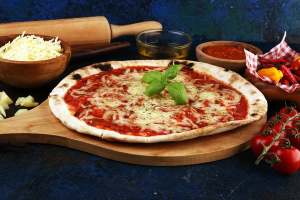 Pizza with tomatoes, mozzarella cheese, basil. Delicious italian