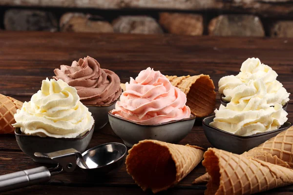 Soft ice cream in flavor vanilla, chocolate and strawberry. Deli — Stock Photo, Image