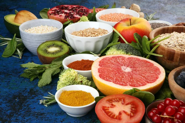 Healthy food clean eating selection: fruit, vegetable, seeds, su