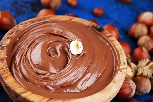 stock image Homemade hazelnut spread in wooden bowl. Hazelnut Nougat cream w