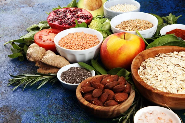 Healthy food clean eating selection: fruit, vegetable, seeds, su