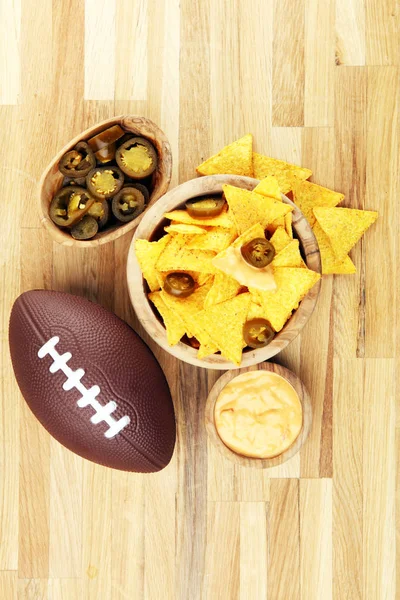 Homemade Nachos with Cheddar Cheese and Jalapenos for football. — стокове фото