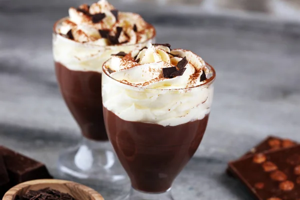 hot chocolate with cocoa and chocolate chip cookies with whipped cream