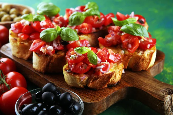 Bruschettas Cutting Board Rustic Background Tomatoes — Stock Photo, Image