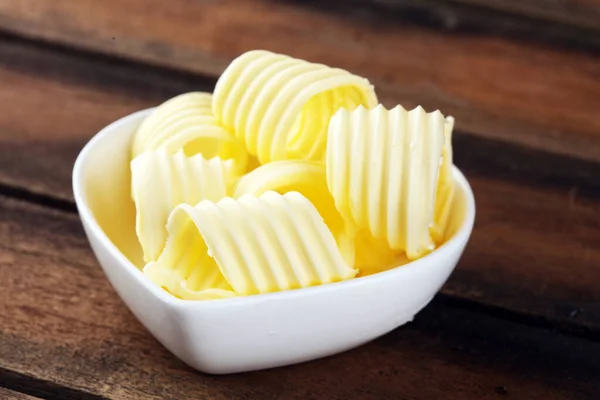 butter swirls. margarine or spread, fatty natural dairy product. High-calorie food for cooking and eating