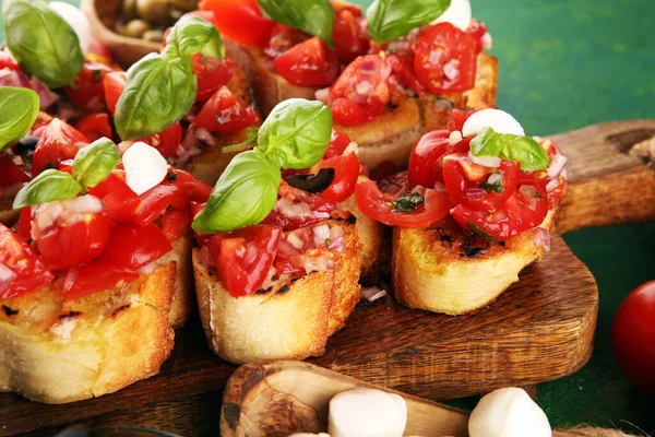 Bruschettas Cutting Board Rustic Background Tomatoes — Stock Photo, Image