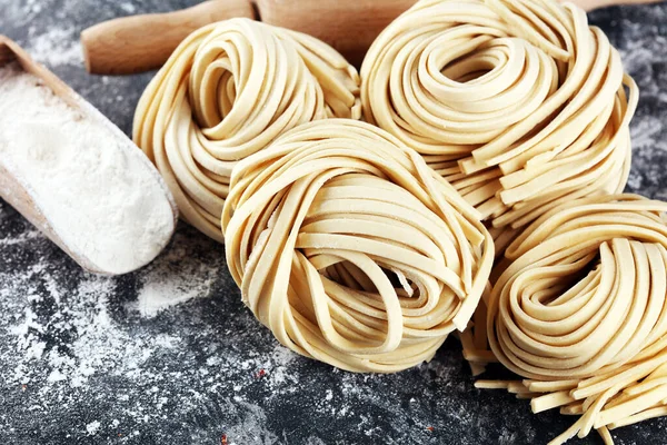 Closeup of raw fresh homemade pasta. fresh italian traditional raw pasta