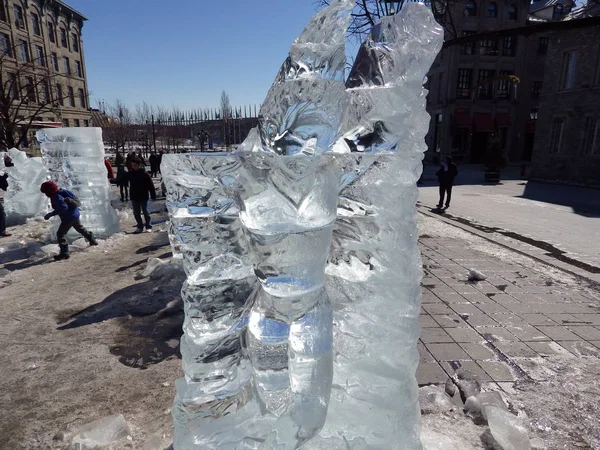 Hand carved ice scultures in the streets of Montreal. These are traditional in old montreal during winter — Stock Photo, Image