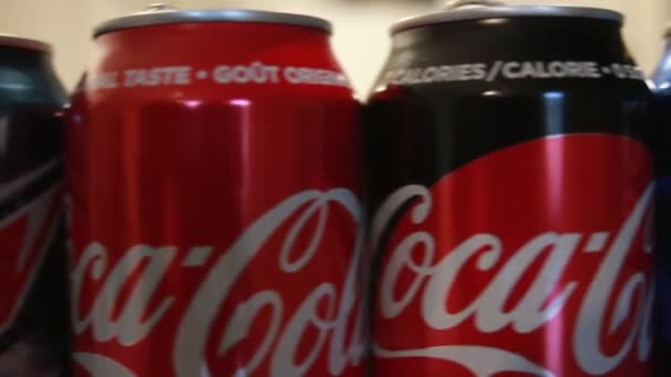 London Canada, November 02 2019: Editorial illustrative video showing various brands of empty soda cans such as coke. Soda is very unhealthy — Stock Video