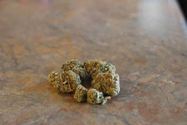 Group of marijuana buds on a table top — Stock Photo, Image