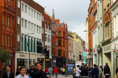 Dublin Ireland, February 19 2018: Large group of people walking on Dame St. This street is home to many business and close to Trinity.