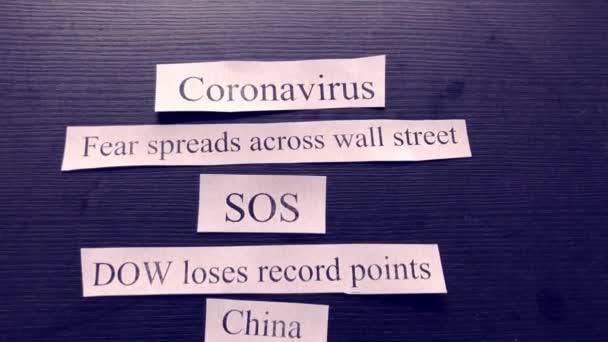 4k footage showing headlines of the coronavirus and market fear — Stock Video