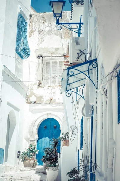 Hot sunny summer day in a blue-and-white Sidi Bou Said city in T