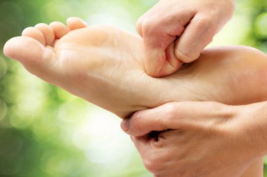 Healing foot massage  clipart